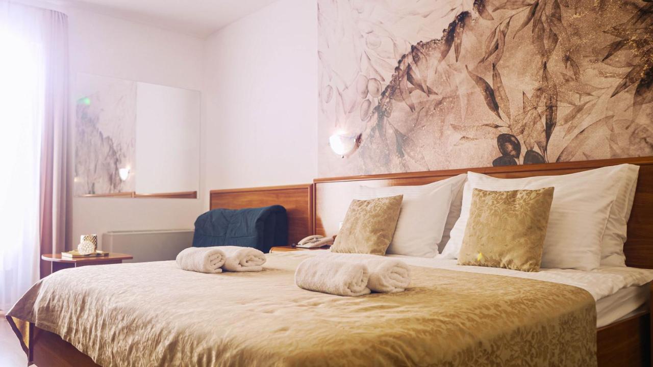 Tweepersoonskamer met 1 of 2 Bedden en een Extra Bed